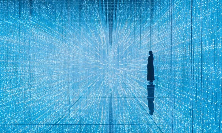 exploring an immersive exhibition at ArtScience Museum Singapore with interactive displays