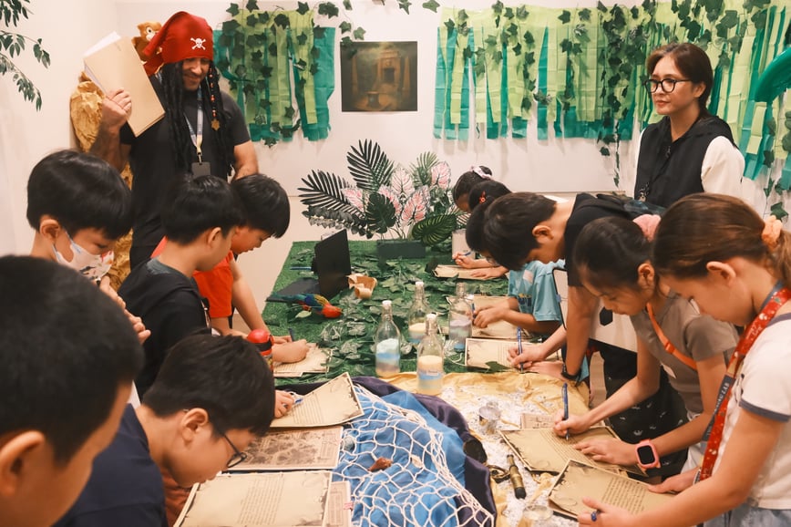 Students of The Learning Lab gathered together to solve puzzles for Escape Room event during June 2025 holidays