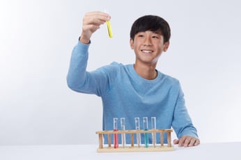 Student at The Learning Lab carrying out a chemistry experiment