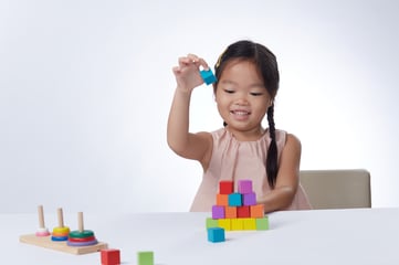 Early Years student at The Learning Lab using visually interactive tools to learn about maths